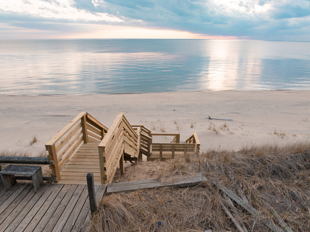 west-olive-custom-deck-builder-stairs-railing-beach-front-lakefront-walden-design